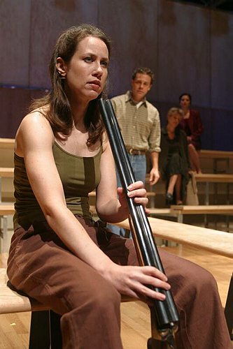 Ruth holding a shotgun, Book of Days