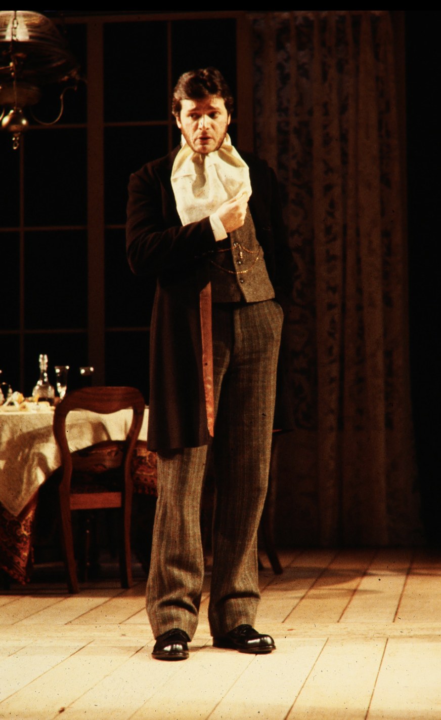 Man beside a table in a waistcoat, An Enemy of the People, Seattle Repertory Theatre, costumes by Laura Crow