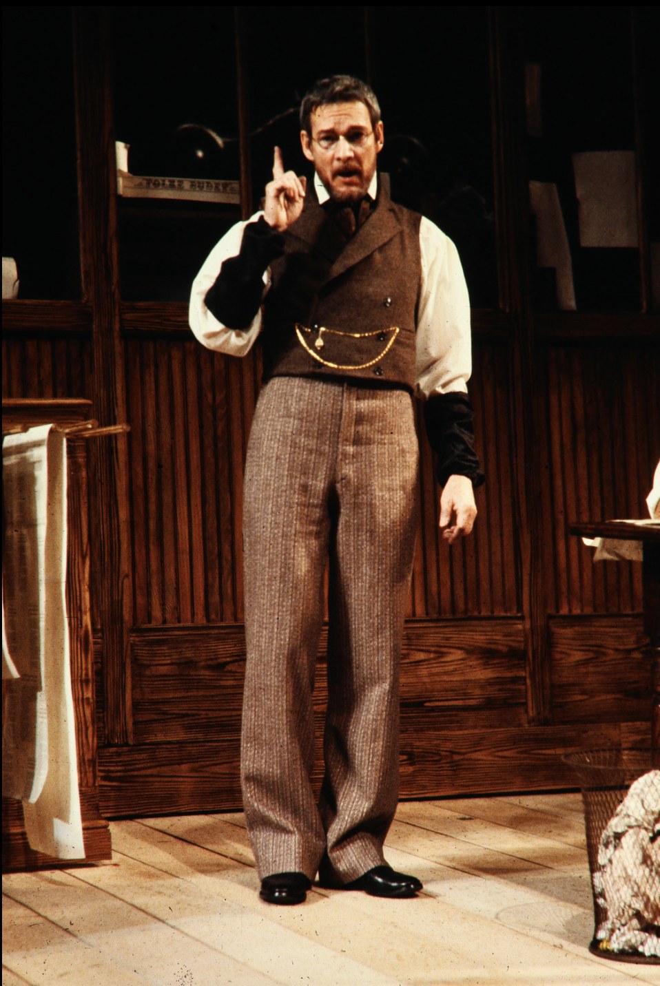 Man in a waistcoat and striped trousers, An Enemy of the People, Seattle Repertory Theatre, costumes by Laura Crow
