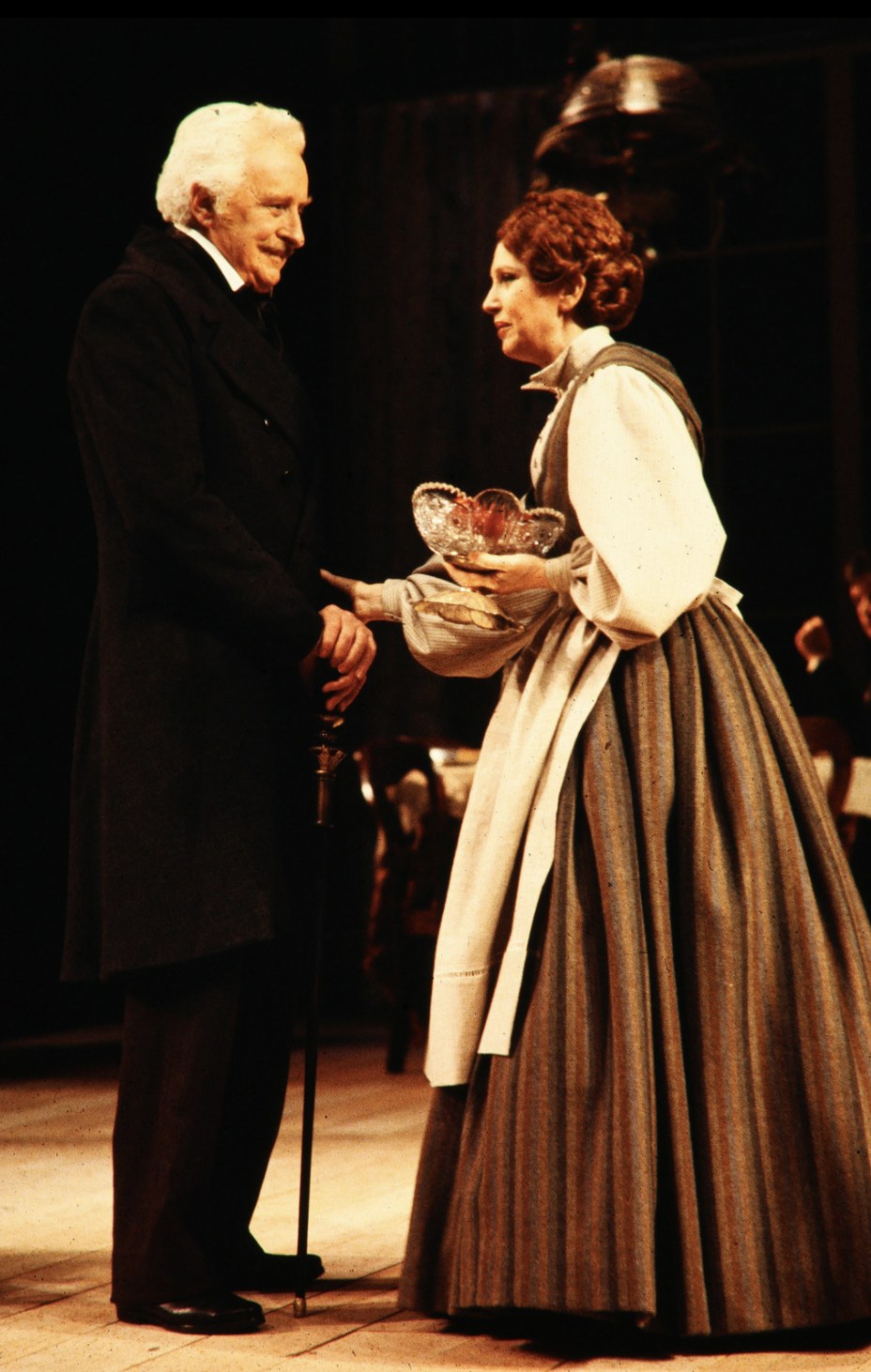 Two performers speaking together, An Enemy of the People, Seattle Repertory Theatre, costumes by Laura Crow