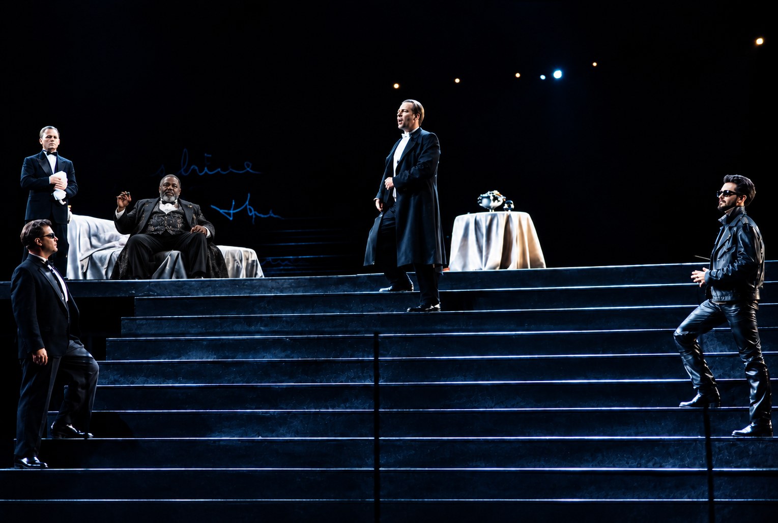 Falstaff seated with the company on the stairs, Falstaff, University of Michigan, costumes by Laura Crow