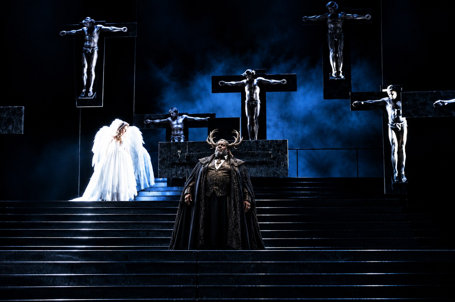 Winged figures and dark-cloaked performers, Falstaff, University of Michigan, costumes by Laura Crow
