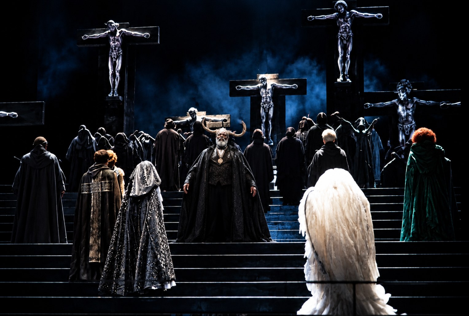 Cloaked ensemble beneath suspended figures, Falstaff, University of Michigan, costumes by Laura Crow