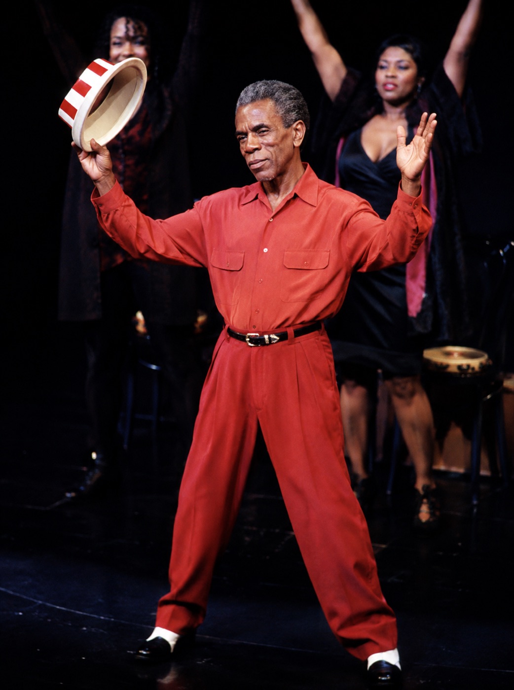 André De Shields in red suit with hat, Harlem Nocturne