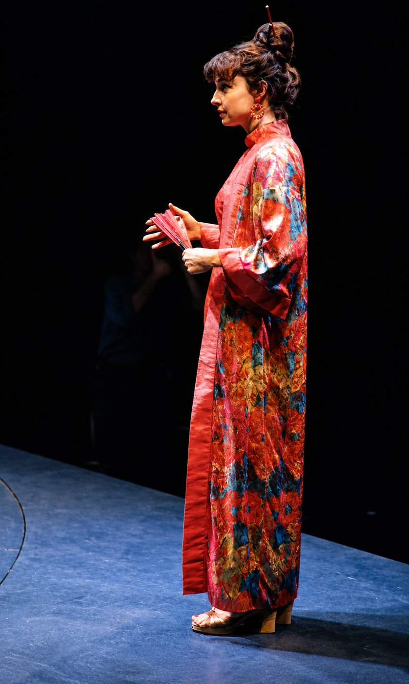 Woman in a red floral kimono, production photo, Robbers, Long Wharf Theatre, costumes by Laura Crow
