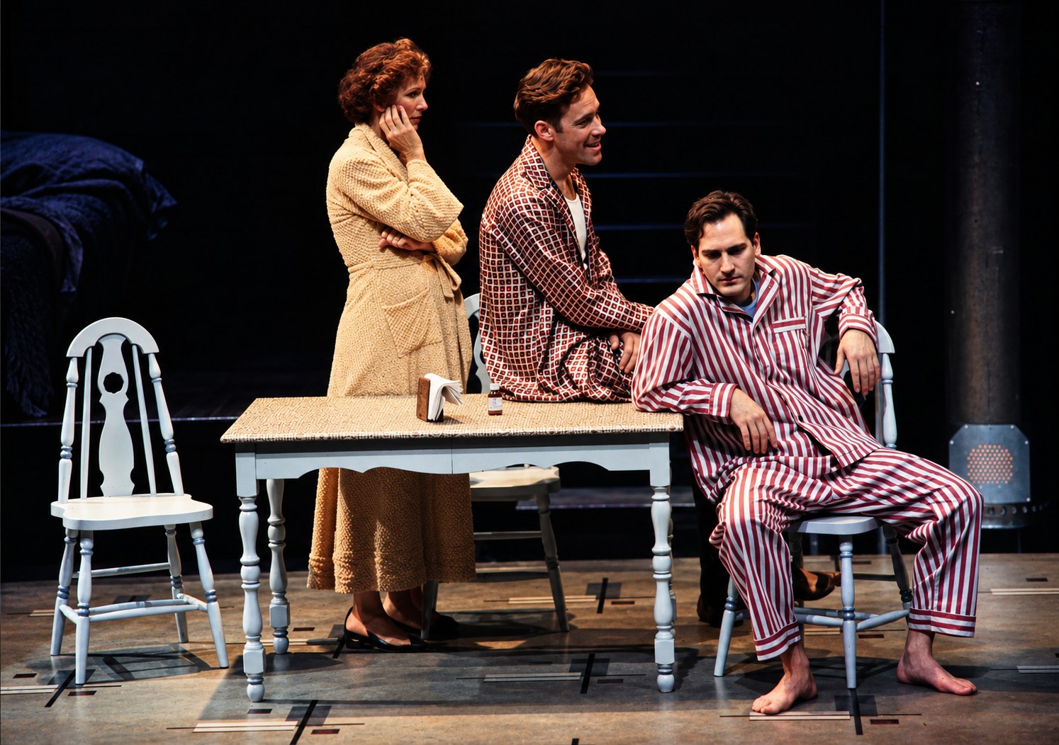 Three performers around the kitchen table, Death of a Salesman, Alley Theatre, Houston, costumes by Laura Crow