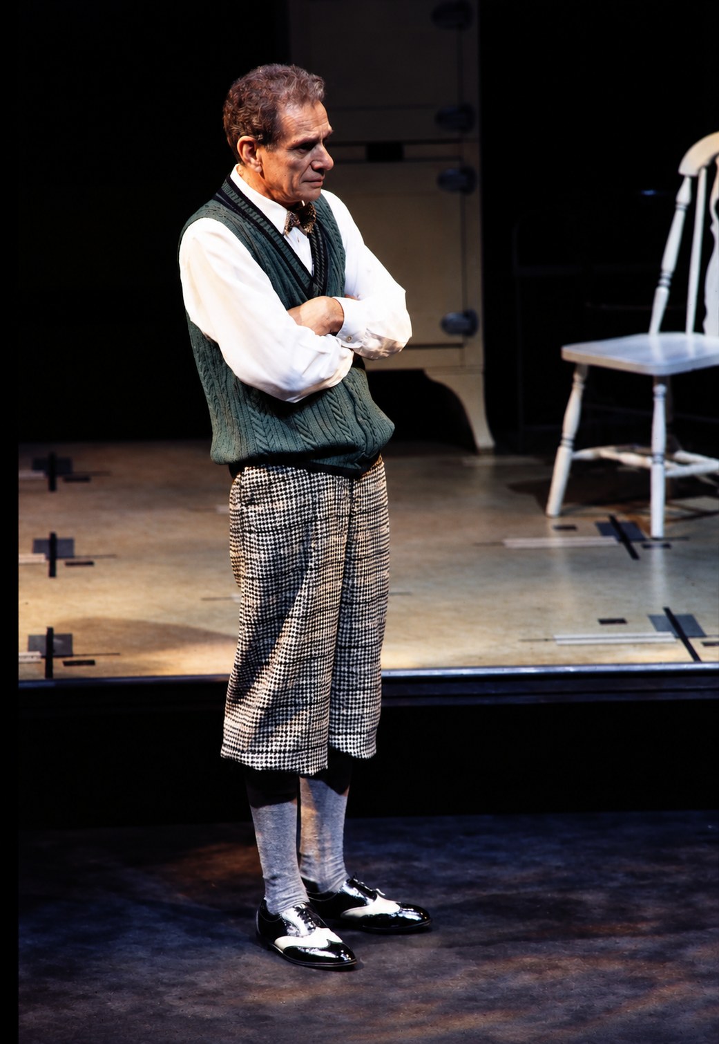 Young man in a sweater vest and knee-length trousers, Death of a Salesman, Alley Theatre, Houston, costumes by Laura Crow