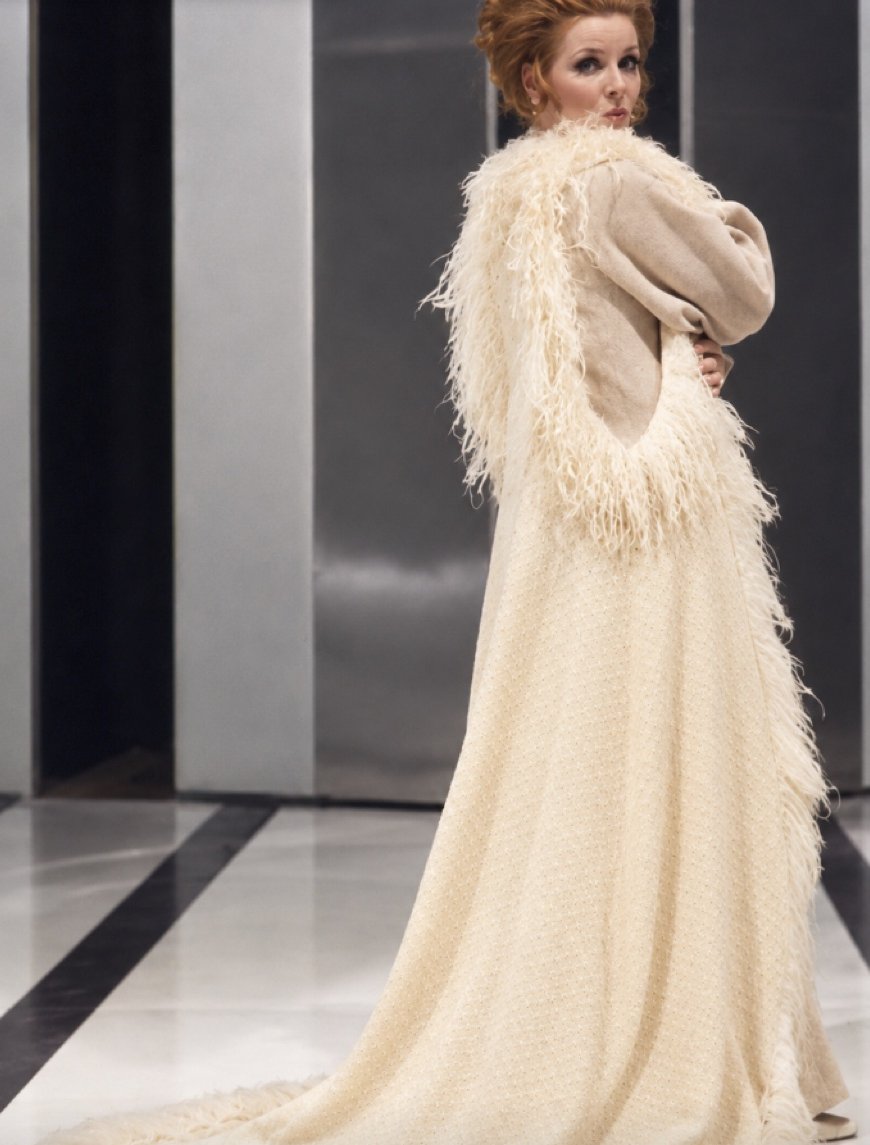 Adrienne Corri in a cream gown with shaggy fur stole, Servants and the Snow, Greenwich Theatre, costumes by Laura Crow