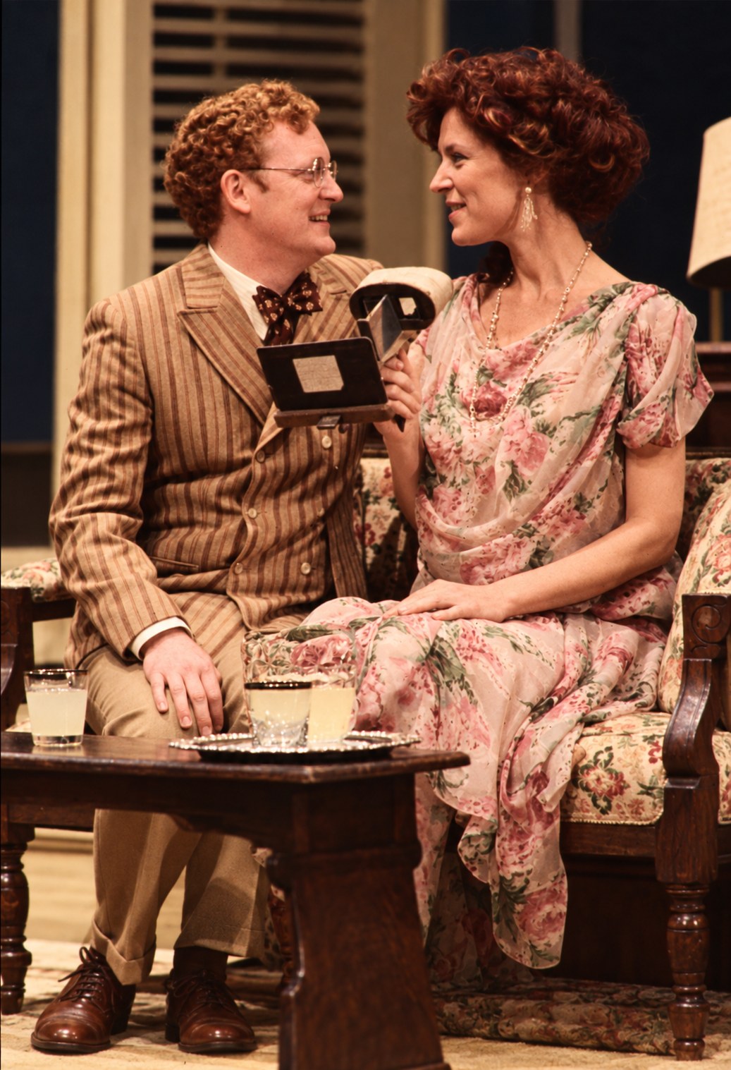 Two women seated together, Summer and Smoke, Ahmanson Theatre, Los Angeles, costumes by Laura Crow